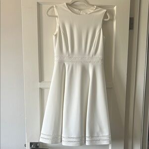Elegant White Sleeveless Dress: Calvin Klein